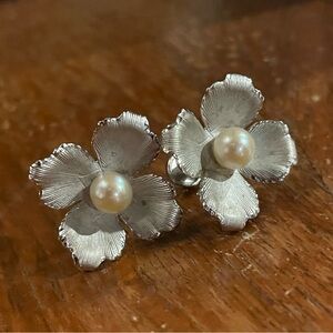 Sterling Silver with a faux pearl, vintage clip on earrings.